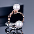 Anillo Perla Gaia dorado en vista lateral